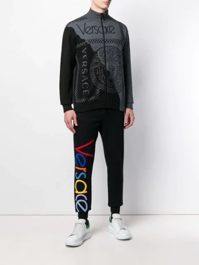 Shop Versace Embroidered Logo Joggers - Black