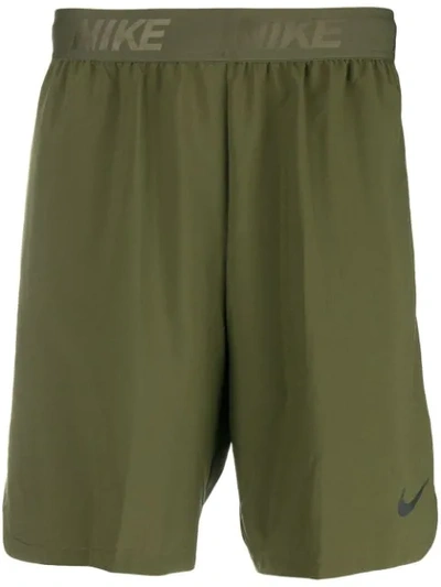 Shop Nike Loose Fitted Shorts  In Green