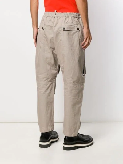 Shop Dsquared2 Printed Logo Tapered Trousers In Neutrals