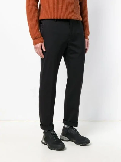 Shop Prada Turn Up Cuffs Tailored Trousers In Black