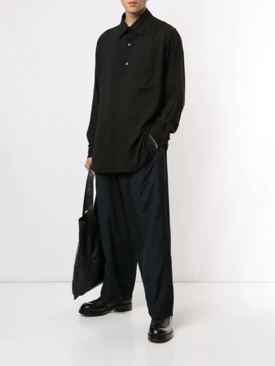 Shop Yohji Yamamoto Wide Leg Trousers In Black