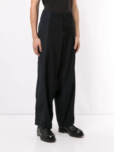 Shop Yohji Yamamoto Wide Leg Trousers In Black