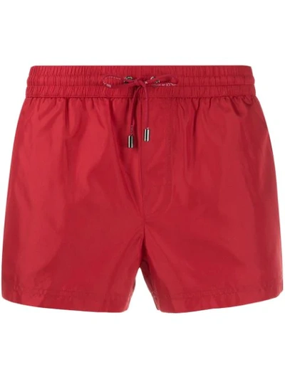 Shop Dolce & Gabbana Drawstring Fitted Swim Shorts In Red