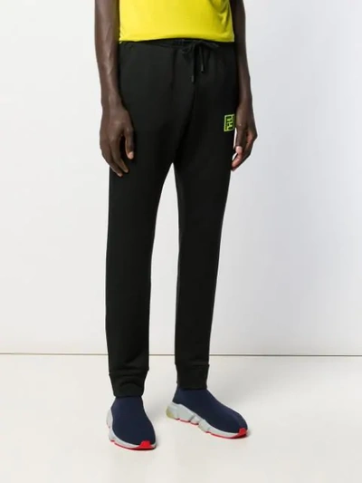 Shop Fendi Logo Patch Track Pants In Black