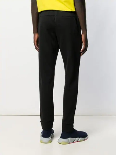 Shop Fendi Logo Patch Track Pants In Black