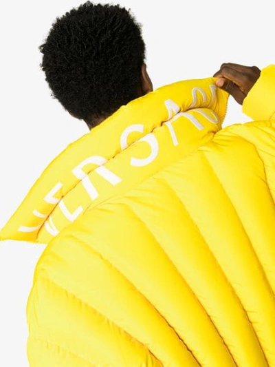 Shop Versace Logo Print Padded Jacket In Yellow