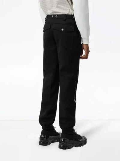 Shop Burberry Press-stud Detail Neoprene Trousers In Black