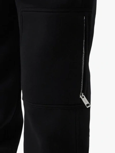 Shop Burberry Press-stud Detail Neoprene Trousers In Black