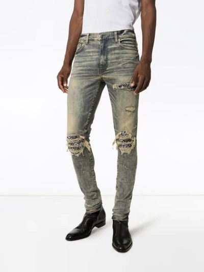 Shop Amiri Mx1 Distressed Bandana Jeans In Blue