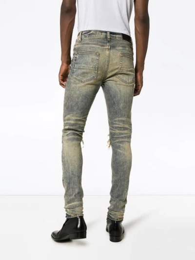 Shop Amiri Mx1 Distressed Bandana Jeans In Blue