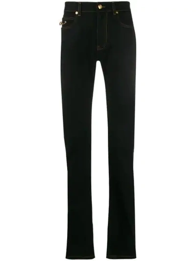 Shop Versace Flared Safety-pin Jeans In Black