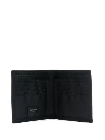 Shop Saint Laurent Nuxx Logo Print Bi-fold Wallet In Black