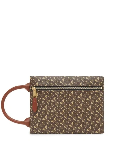 Shop Burberry Monogram Print E-canvas Portrait Pouch In Brown