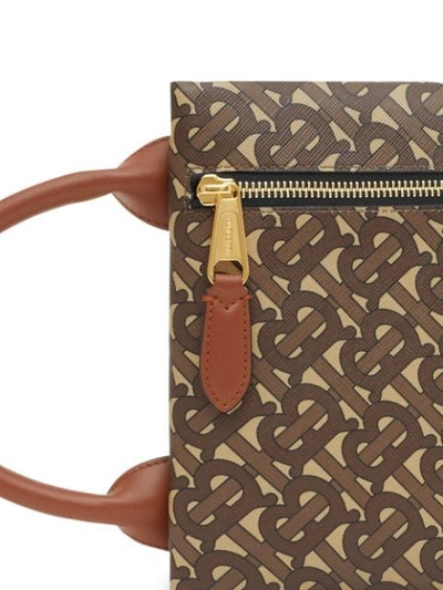 Shop Burberry Monogram Print E-canvas Portrait Pouch In Brown