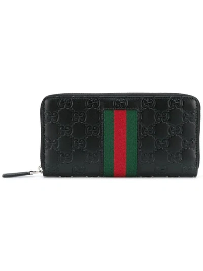 Shop Gucci Signature Web Zip-around Wallet In Black