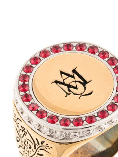 Shop Alexander Mcqueen Logo Embossed Signet Ring In Gold