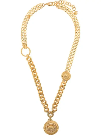 Shop Versace Embellished Medusa Pendant Necklace In Gold