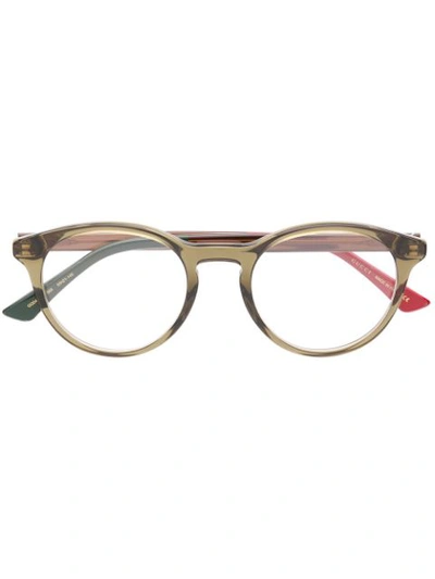 Shop Gucci Oval Framed Glasses In Green