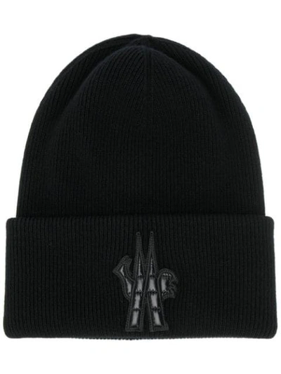 Shop Moncler Logo Patch Knitted Beanie In 999