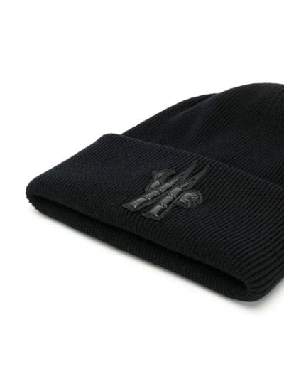 Shop Moncler Logo Patch Knitted Beanie In 999
