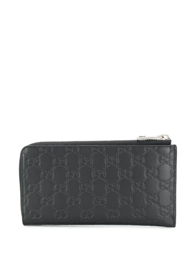 Shop Gucci Signature Zip-around Wallet In Black