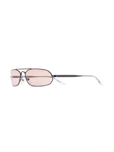 Shop Balenciaga Grey Thin Oval Sunglasses In Schwarz