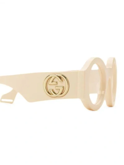 Shop Gucci Round Frame Sunglasses In Neutrals