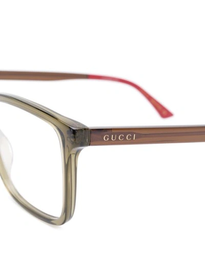 Shop Gucci Rectangle Frame Glasses In 绿色