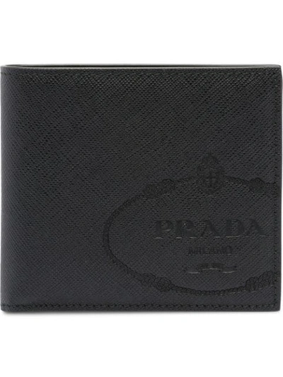 Shop Prada Logo Embossed Wallet In Black