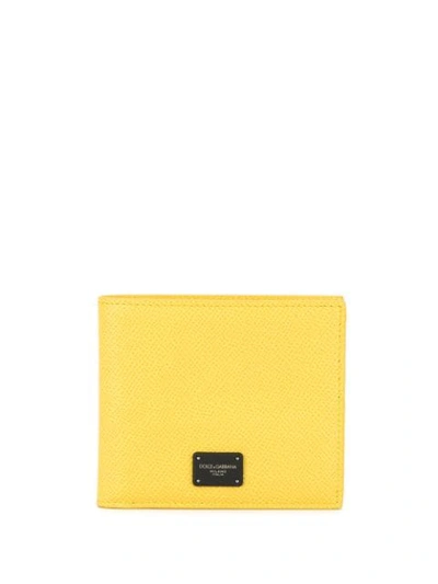 Shop Dolce & Gabbana Logo Plaque Bifold Wallet In Yellow