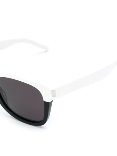 Shop Saint Laurent Round Frame 51 Sunglasses In Black