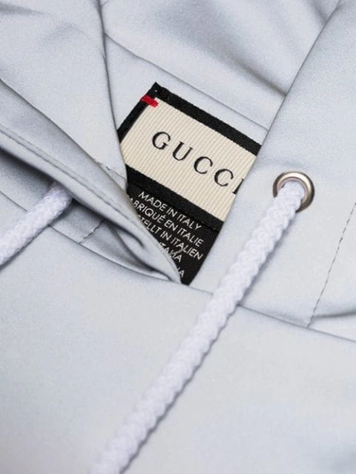 Shop Gucci 3m Reflective Web Rain Hood In Silver