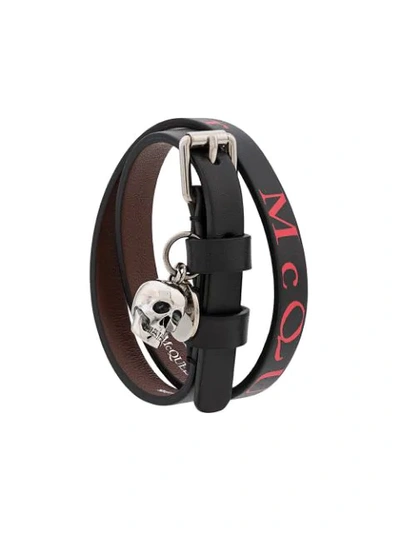Shop Alexander Mcqueen Logo Print Skull Charm Bracelet In Black