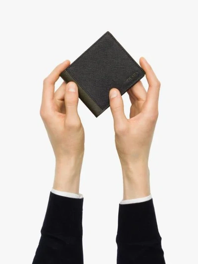 Shop Prada Bi-fold Logo Wallet In Black