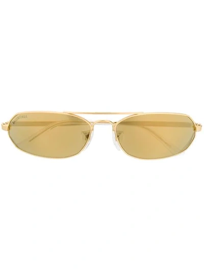 Shop Balenciaga Agent Oval-frame Sunglasses In Gold