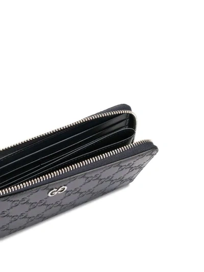 Shop Gucci Signature Zip-around Wallet In Blue