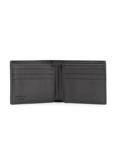 Shop Ferragamo Double Gancio Billfold Wallet In Black