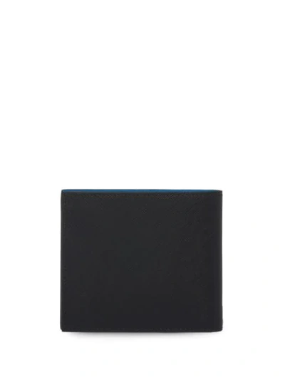 Shop Prada Saffiano Bi-fold Wallet In Black