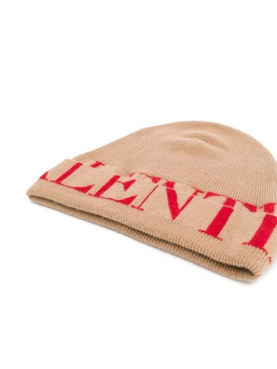 Shop Valentino Split Logo Knitted Beanie In Neutrals