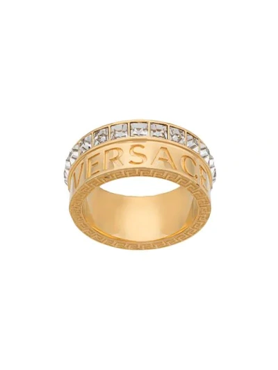 Shop Versace Crystal Logo Ring In Gold