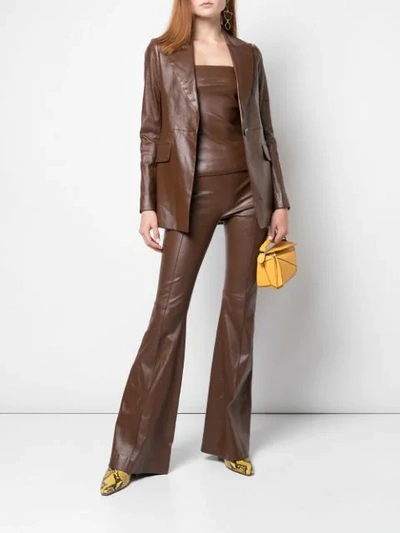 Shop Rosetta Getty Pintuck Flared Trousers In Brown