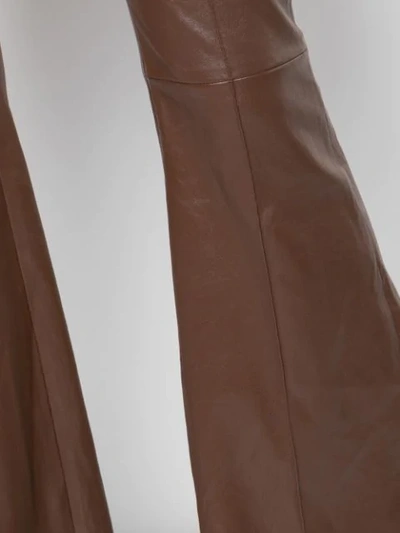 Shop Rosetta Getty Pintuck Flared Trousers In Brown