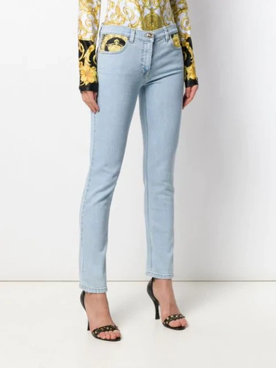 Shop Versace Baroque-print Skinny Jeans In Blue