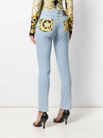 Shop Versace Baroque-print Skinny Jeans In Blue