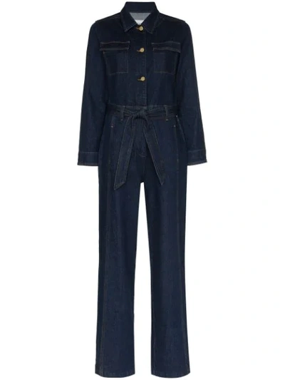 Shop Frame Flared Leg Denim Jumpsuit In Blue