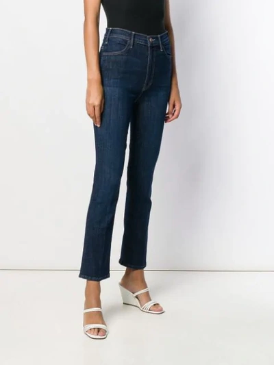 Shop Mother Cropped Bootcut Jeans In Blue
