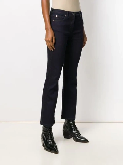 Shop Valentino Vlogo Flared Cropped Denim Jeans In Blue