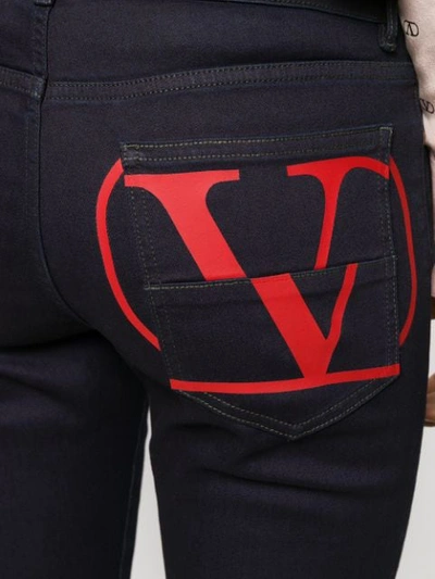 Shop Valentino Vlogo Flared Cropped Denim Jeans In Blue
