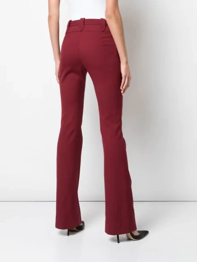 Shop Altuzarra Serge Tailored Flared Trousers In Red