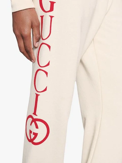Shop Gucci Jogging Pants With  Logo In White